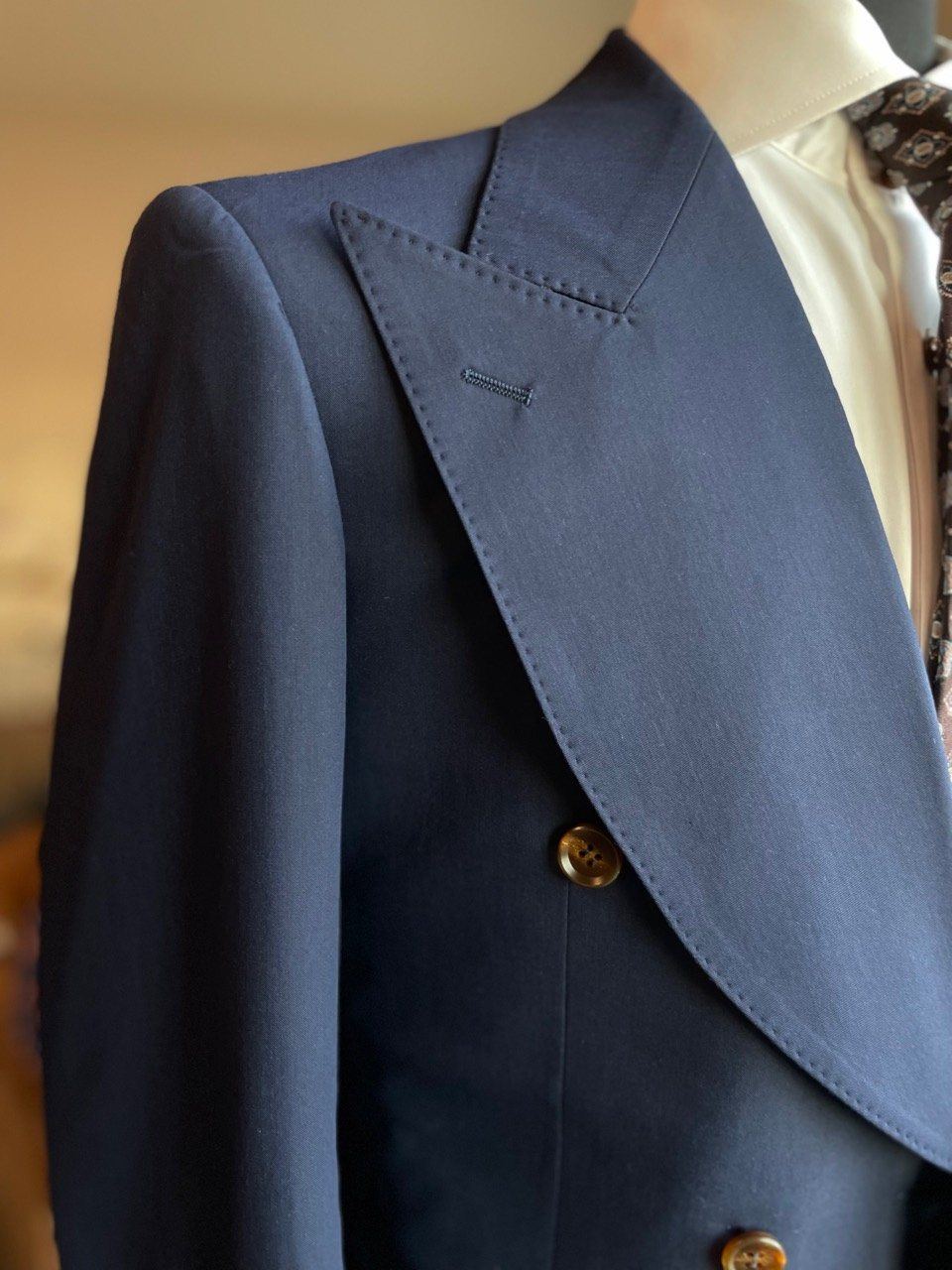 Navy custom suit shawl lapel detail